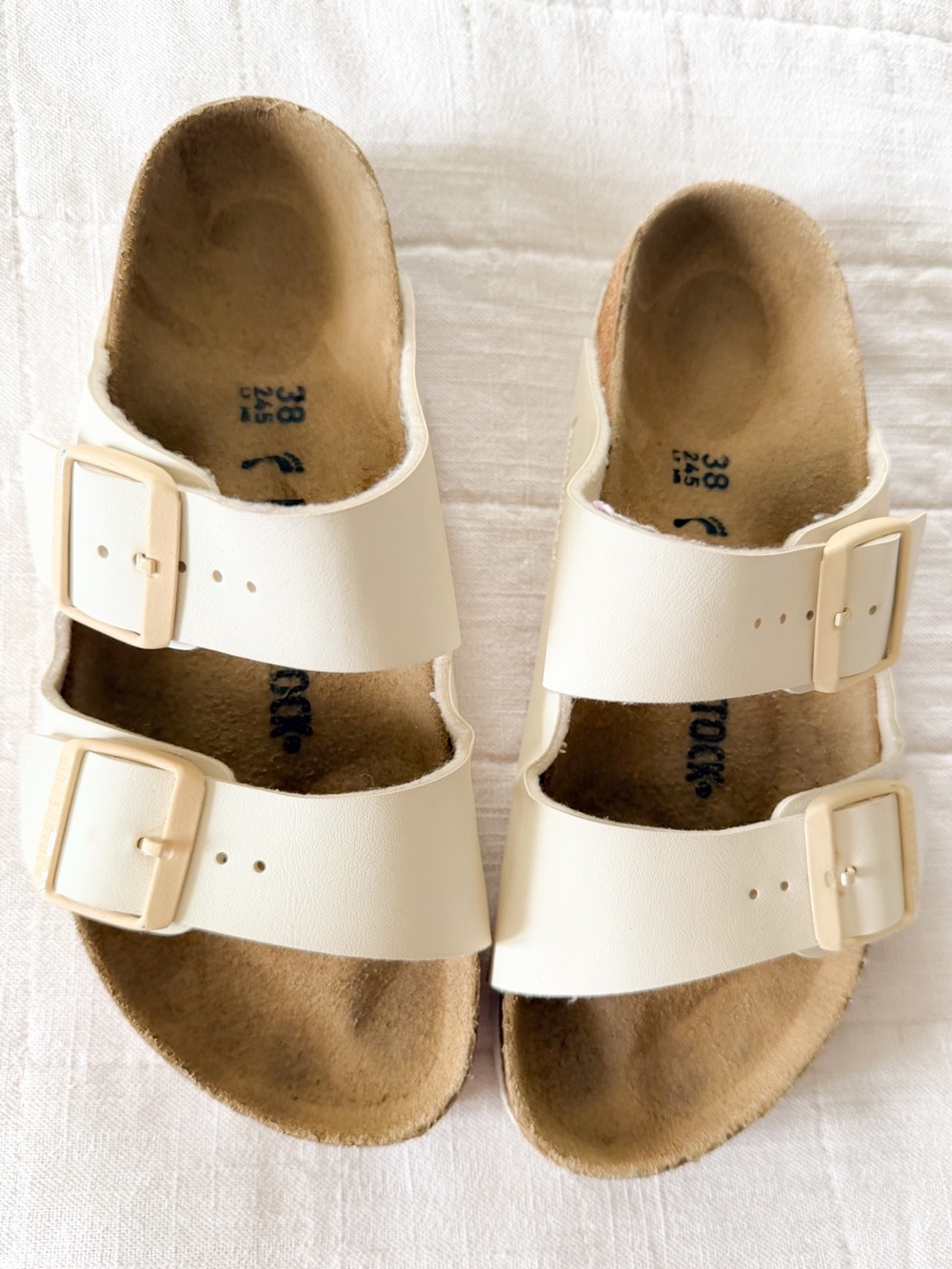 Birkenstock Arizona Two-Strap Sandals in Cream with Cream Buckles